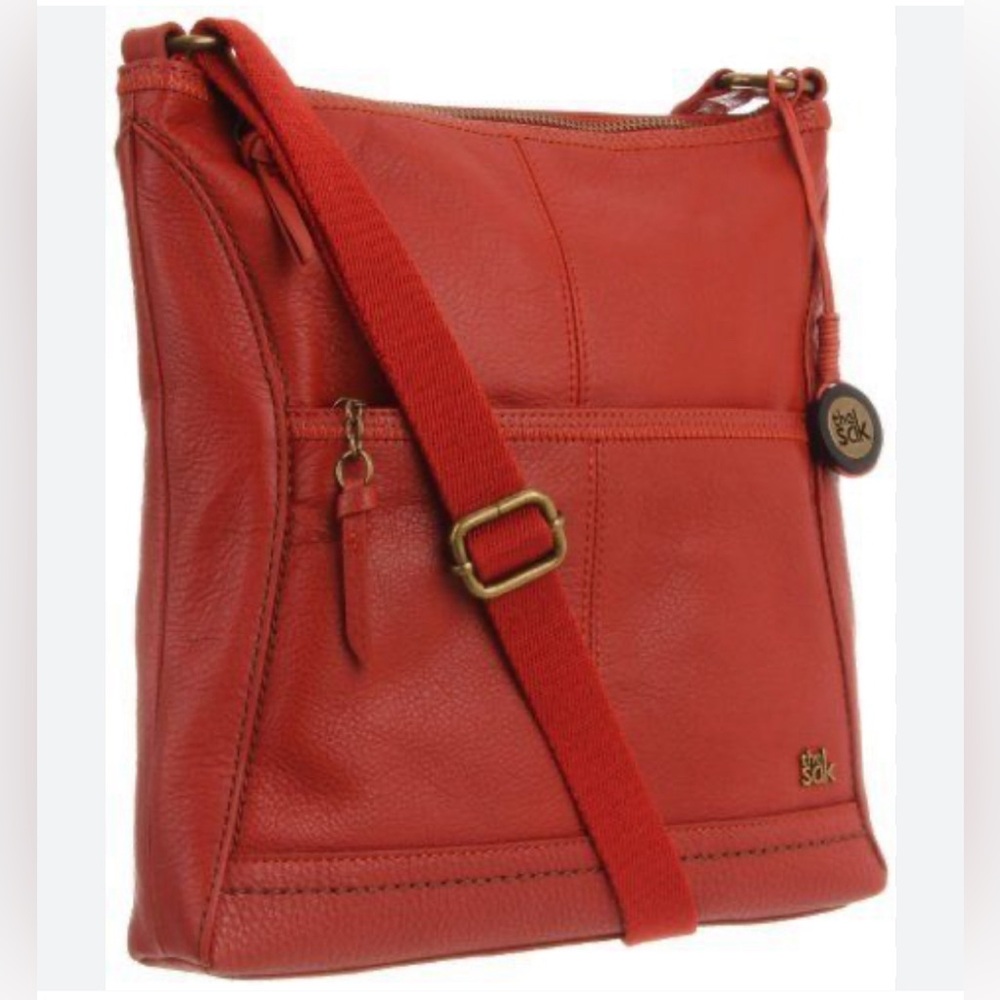 The Sak midsize leather Lucia Crossbody Handbag In Tangerine.